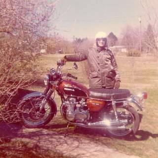 Fresh off my future father-in-laws truck after the trip back from Rockwood Honda. This was a 1974 model purchased in February of 1974. My first ever new motorcycle, she cost me $1360, at lot of change at the time. : Motorcycle