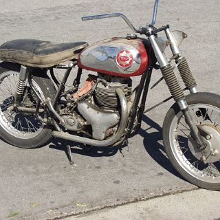 While my BSA didn't look quite this bad it wasn't far off. Mine had scrambler type pipes on it and hape hangers. This one appears to have a missing oil tank, among other things.I wish I had a picture of it but this is one that got away.