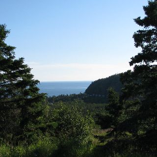 A train winds its way around the bluffs along Superior