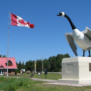 A monument to commemorate the completion of the Trans-Canada hwy 17. This town didn't have  road access to the outside would until TCH was completed in 1960.