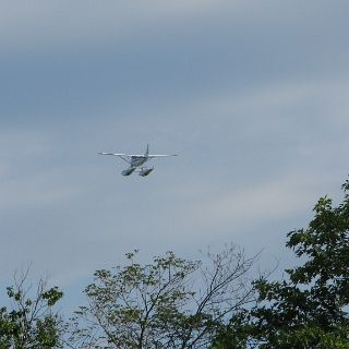 Low flying bush plane scud running. (flying low in marginal weather)