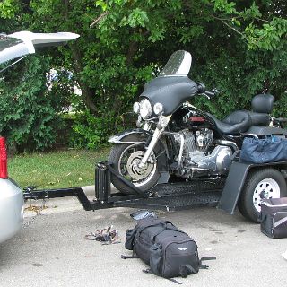 Loading up in Madison. It was great of the people at the Super8 Motel to let us park our car and trailer in their parking lot for a week. Not only that, they checked on it from time to time for us.