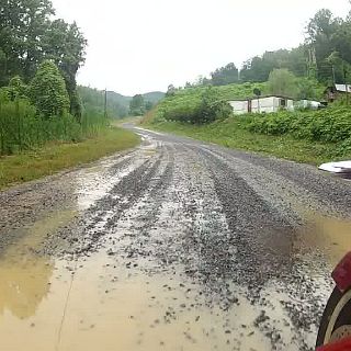 ...until it turns into a gravel road and it's recently fell a flood!   This road is Bull Mountain road and runs between Del Rio and Hartford Tennessee. We had to navigate about three miles of this.