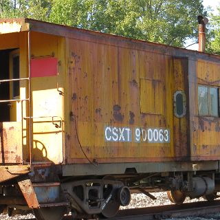 There were several of these parked in the yard. Probably awaiting their turn to be cut up or setup in some city park for kids to play on.