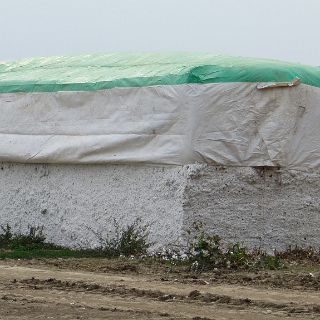 Large bail of raw cotton.