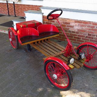 One of the Rockefelters electric car used at the Club : Camping, Okefenokee trip, Riding