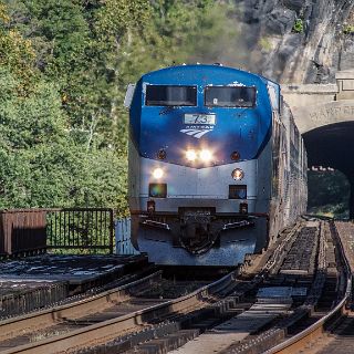 An Westbound Amtrac crosses the bridge into Harpers Ferry : Motorcycle, Riding, Touring