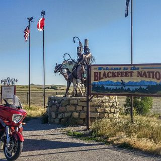 Heading southeast I exit the Blackfeet reservation on my way to Great Falls. : Touring