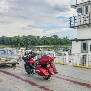 Taking the Kampsville Ferry over the Illinois river. : Touring