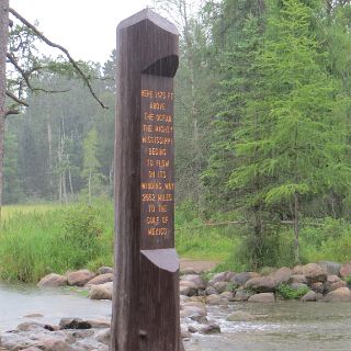 At the Mississppi headwaters. You can wade across it here. Rain, it did! : Touring