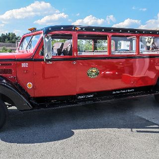 A Glaicer park Red Bus : Touring